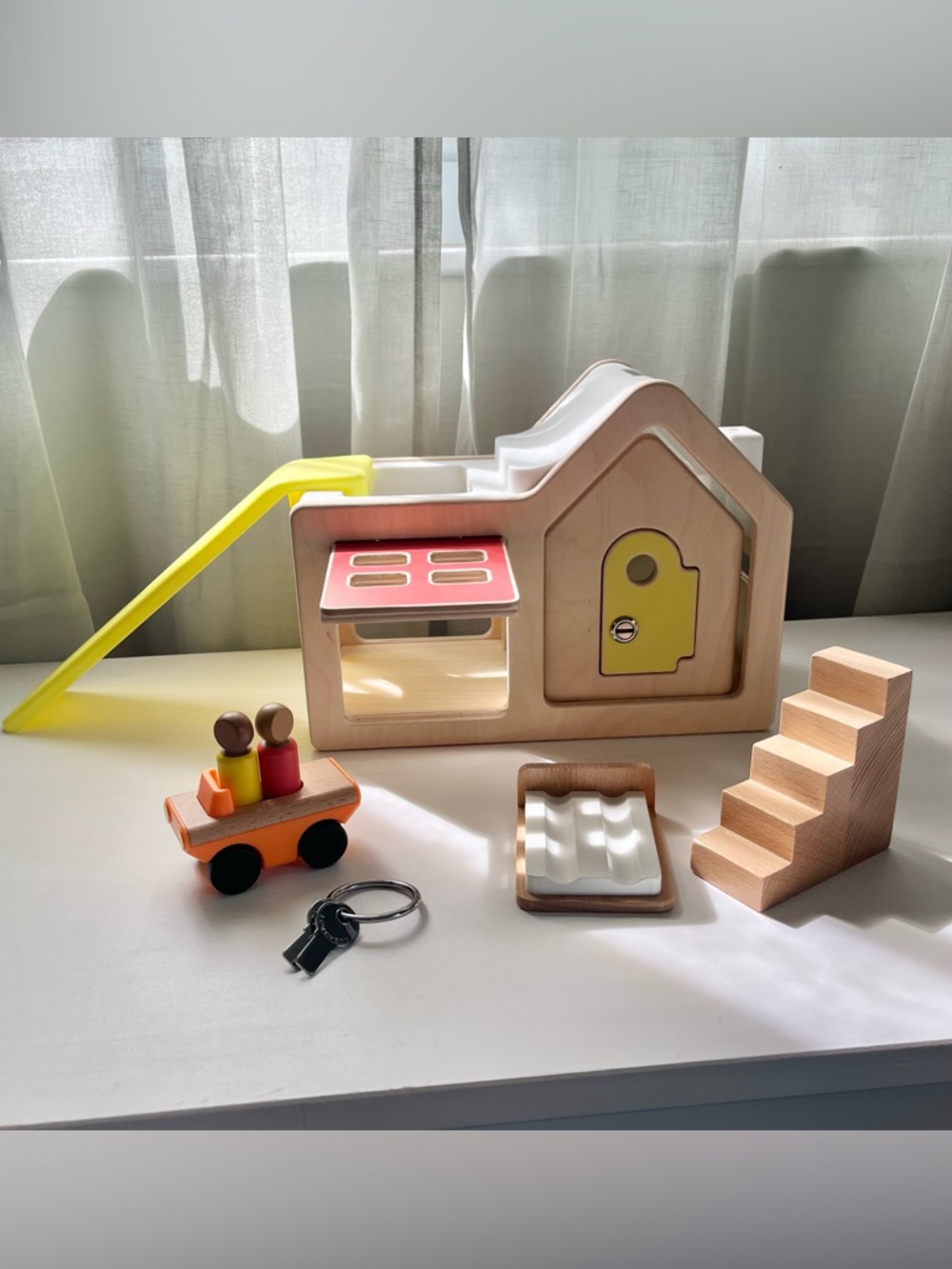 Lovevery Modular Playhouse With Wooden Accessories and Two Seated Speedster